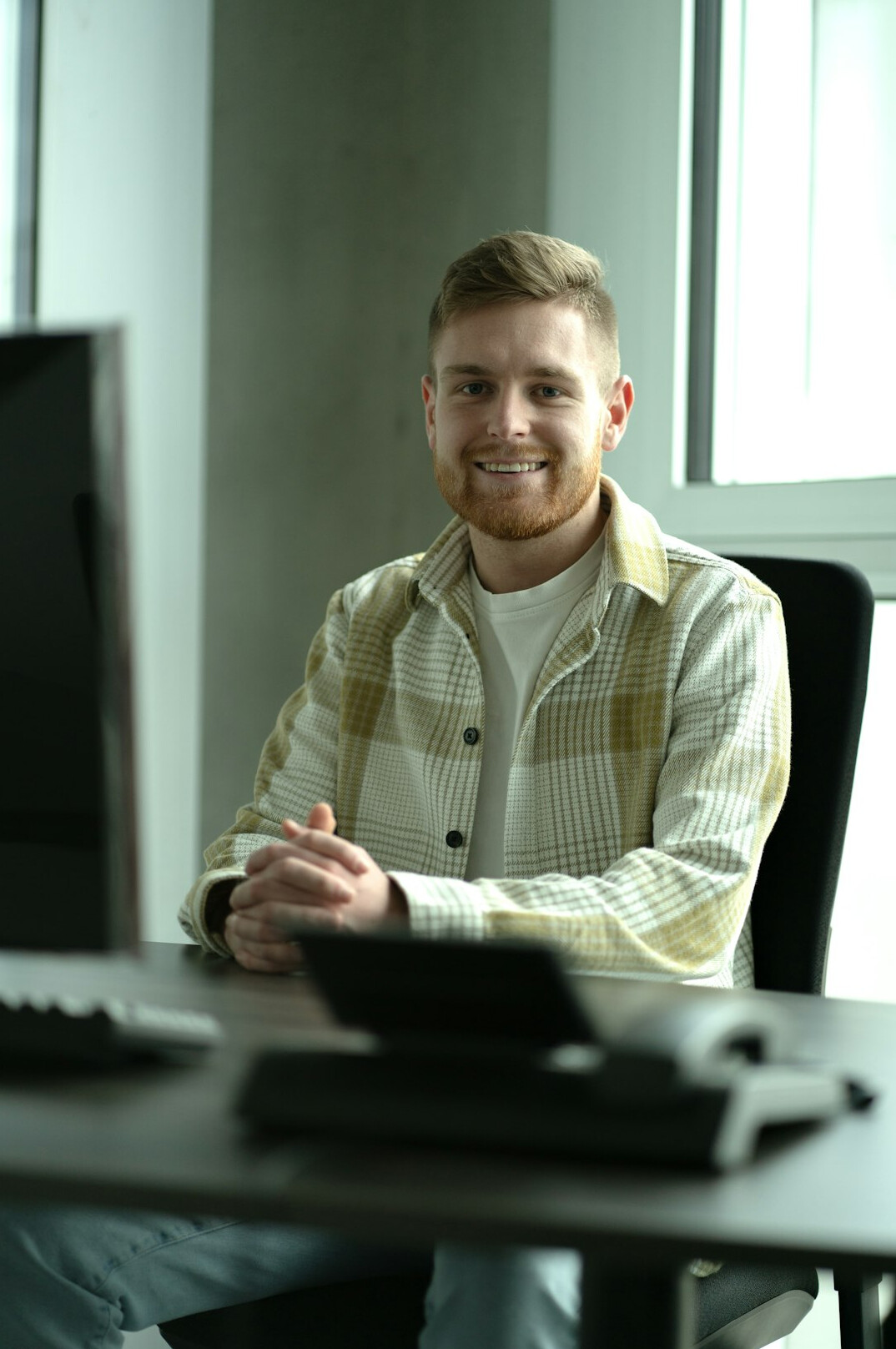 young coder smiling